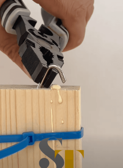 Reconnecting a split or cracked board with a single nail